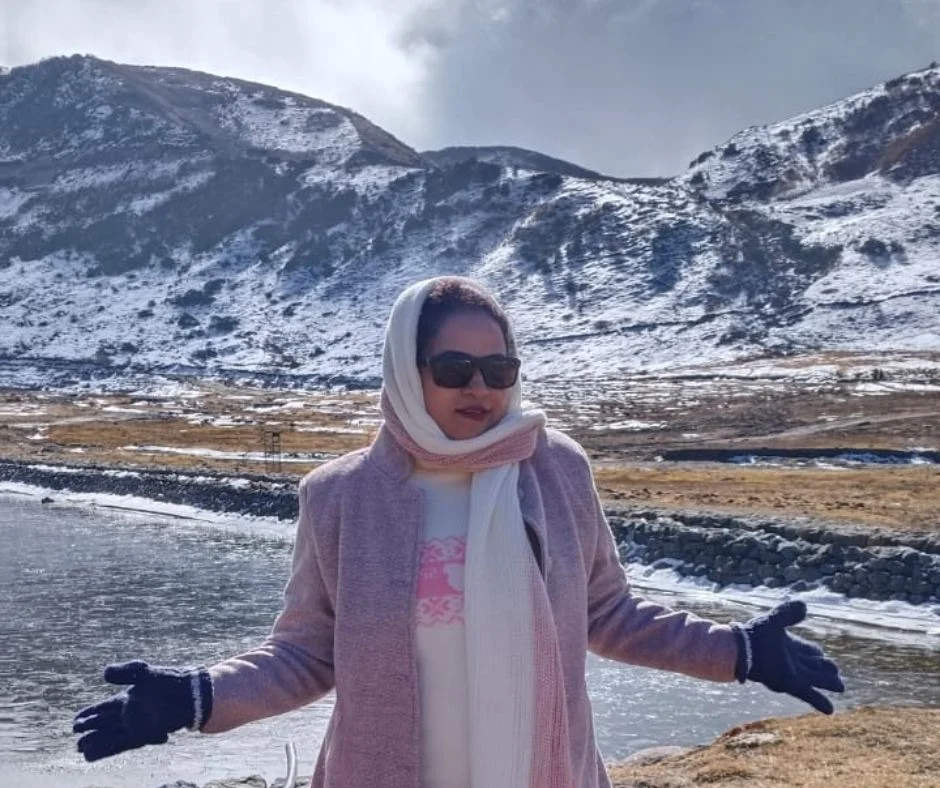 Guests standing at Tukla Valley during their Silk Route Tour Packages from NJP station